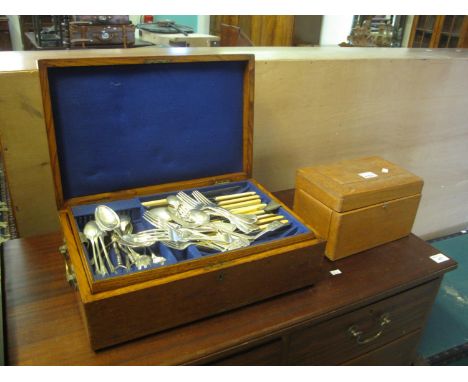 Oak canteen of mixed plated cutlery, together with a tea caddy of plain form(2) 