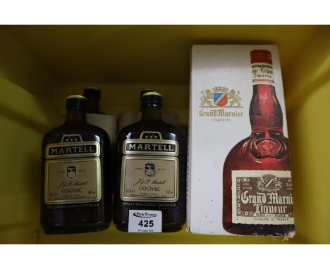 Four bottles of Martell cognac, 34cl. Together with a boxed Grand Marnier liqueur. (5)(B.P. 24% incl. VAT) 