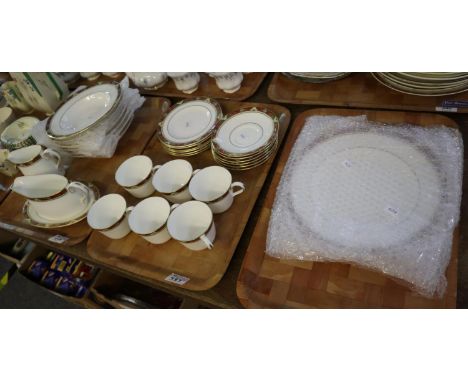 Three trays of Royal Crown Derby English bone china cloisonne design tea and dinnerware items to include; teacups and saucers