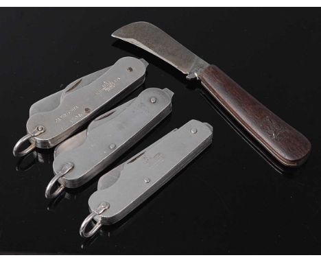 * A British Military issue pocket knife, having two folding blades, the grips with War Department mark, Taylor, Sheffield, En