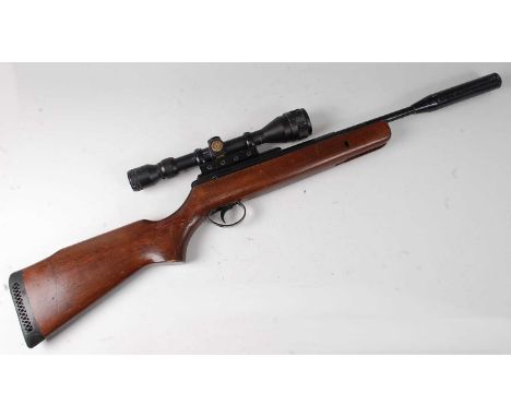 * A B.S.A. .177 break barrel air rifle with sound moderator and Japanese scope, serial number AR 21350, 93cm.Condition report