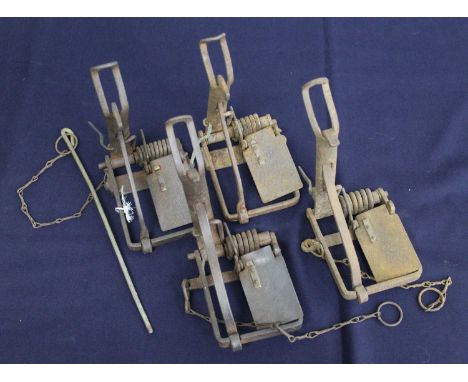 * A Sawyer RSPCA 9-coil spring rabbit trap; together with three other similar traps (4)Condition report: From ‘A Broad Collec