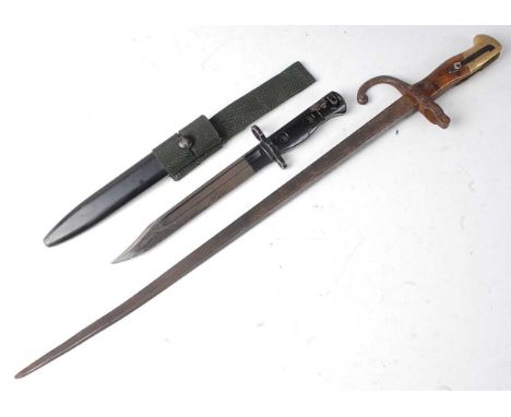 A British L1A3 bayonet, having a 20cm Bowie type blade, the steel muzzle ring stamped S B, the two piece grip numbered 960025