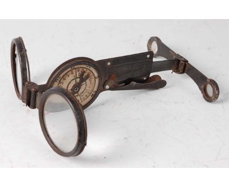 A WW I German combination folding pocket binocular compass and signal mirror, stamped Made in Germany, 13cm.