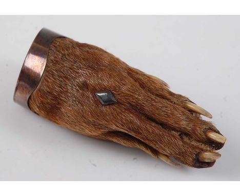 * An early 20th century taxidermy Otter (Lutra lutra) pad brooch, the silver mount engraved E.C.O.H. Stanford Water, 1922, ma