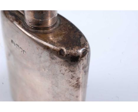 An Edwardian silver pocket hip flask of oval form, engraved W F B Sept 7th 1901, Goldsmiths & Silversmiths Co., London, (date