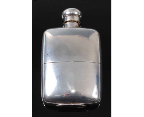 A modern Continental silver pocket hip flask, having a bayonet cap and removable cup with gilt interior, h.11cm.Condition rep