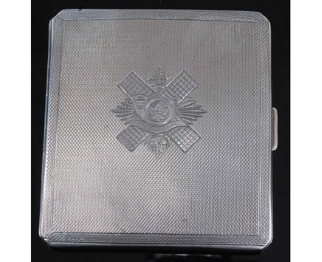 A WW II silver pocket cigarette case of hinged square form, having engine turned decoration and engraved with the Canadian Hi