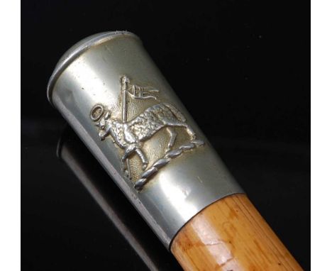 A military swagger stick, having a bamboo shaft and nickel cap with The Queen's (Royal West Surrey) crest, 57cm.