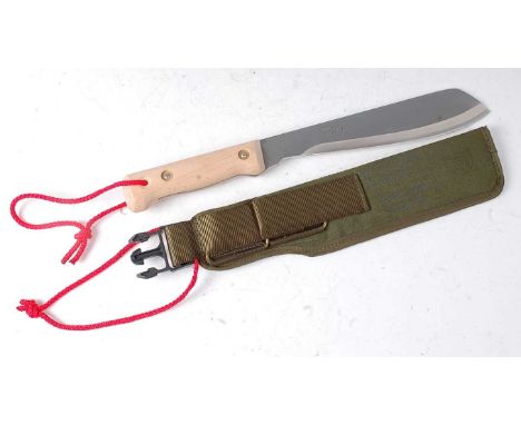 * A British Bolo machete, the 26cm blade marked 17-9944 and dated 1993, housed in a nylon sheath, 41cm.Condition report: From