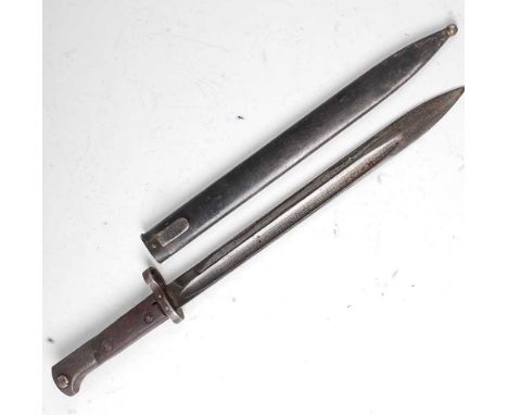 A Czechoslovakian M33/40 Mauser bayonet, the 30cm fullered blade stamped to the ricasso CSZ 0, having a two piece walnut grip