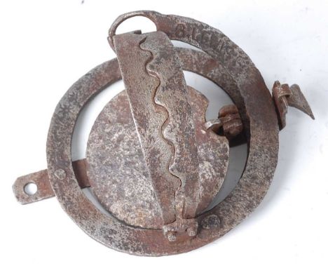 * An early 20th century pole trap, having 3 1/2 domed serrated jaws, the spring neck stamped S. Lewis.Condition report: From 