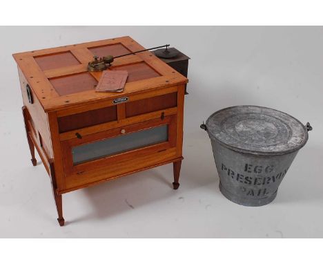 * An early 20th century stained beech 'Saxonia' hot air incubator, bearing label for Frank Roberts, unused and with instructi