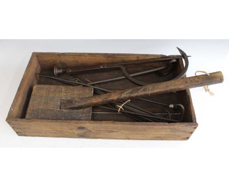 * A collection of assorted thatcher's tools, to include a thatcher's legget, needle, traveller measure, hooks, kneepads, reed