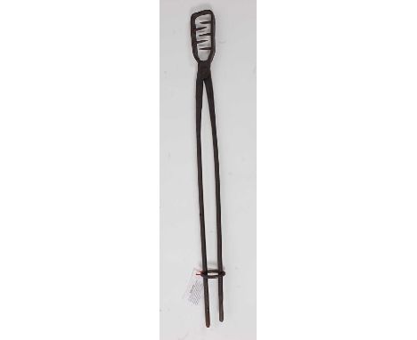 * A pair of early 19th century blacksmith-made wrought iron badger tongs, having 6" serrated jaws, 95cmCondition report: From