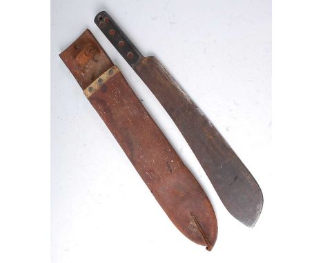 A WW II British Army jungle machete, having a 38cm blade and composition grips, housed in a leather sheath stamped D.M. &amp;