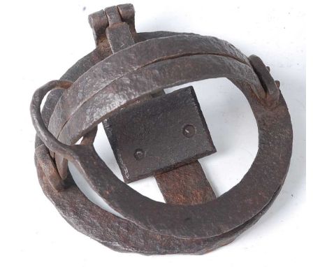* An unusual 19th century left handed/reverse coil pole trap, having 4" domed smooth jaws.Condition report: From ‘A Broad Col