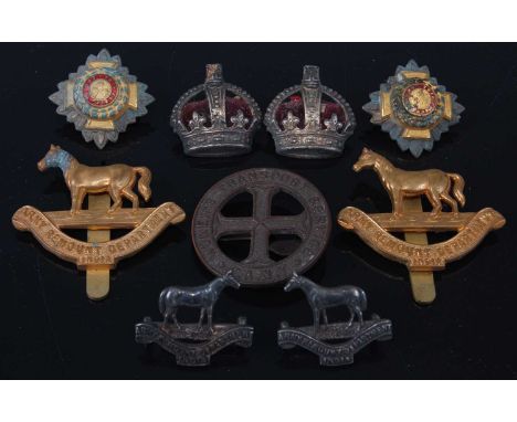 A Women's Transport Service F.A.N.Y. (First Aid Nursing Yeomanry) cap badge, marked J.R. Gaunt London, together with various 
