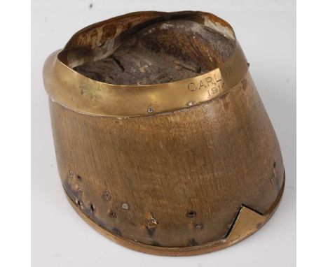* An early 20th century taxidermy Horse (Equus ferus caballus) hoof, the brass mount engraved Carlow 1914 and stamped to the 