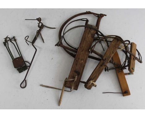 * A large collection of assorted traps, to include six rat/vermin traps, pocket gopher traps, self-set rat traps etcCondition
