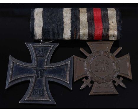 An Imperial German Iron Cross 2nd class, the suspension ring marked FR?, probably Frank &amp; Reif, Stuttgart, together with 
