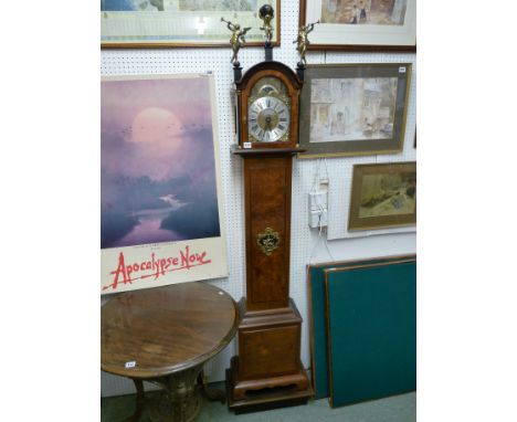 J M Verbrugge of Amsterdam Longcase walnut clock with brass face and figural surmounted decoration, 195cm in height