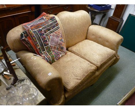 Art Deco Upholstered Sofa with floral detail on turned bun feet with drop end, possibly by Heals 