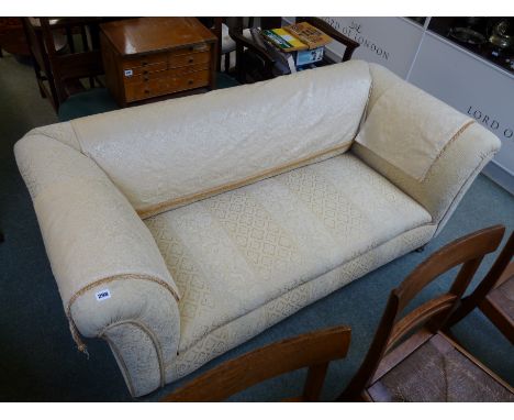 Late Victorian 2 seater cream foliate upholstered sofa on turned caster legs, 165cm in Length