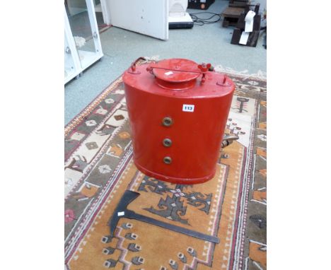 Antique fireman's back pack fire extinguisher with brass fittings and a fire axe 