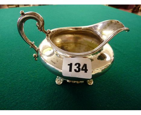 Silver Milk Jug of squat from with foliate handle and scroll base London 1834 by Edward Edward Jr & W Barnard, 135g, Conditio