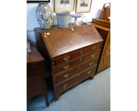 George III Mahogany fall front bureau with Shell motif inlay and fitted ivory handle interior drawers, over 4 drawers and bra