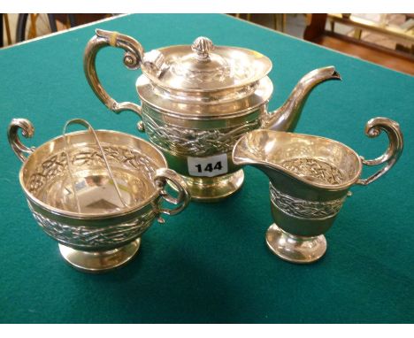 Aesthetics movement Bachelor's silver teapot, Milk jug and sucrier with embossed Dragon decoration Birmingham 1912, Condition