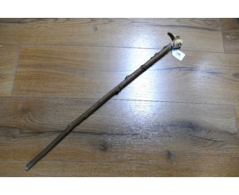 Walking stick or riding crop with grotesque carved antler face