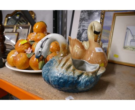 Majolica style orange fruit table centre piece and two ceramic swan planters