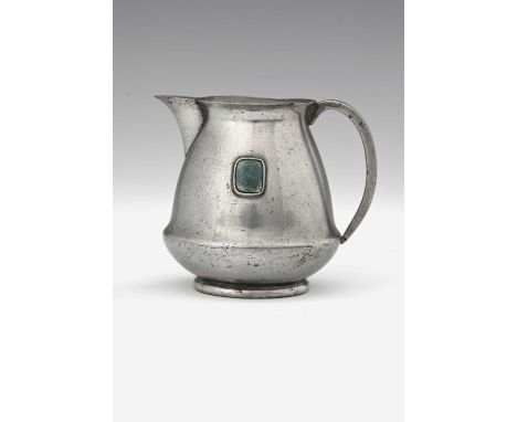 An Arts and Crafts pewter and Ruskin cabochon jug, William Hutton for G L Connell, ogee conical form, set with rectangular bl