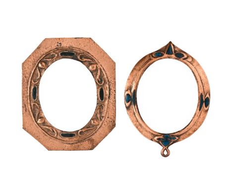 Two Arts and Crafts copper and enamel frames, one of octagonal form repousse embosed with foliate motifs between geen enamell