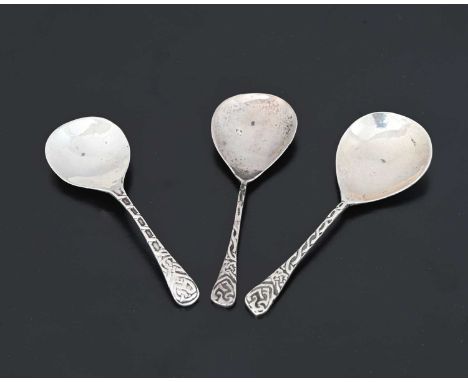 Three Iona Arts and Crafts silver caddy spoons, various makers and dates including J Cameron of Kilmarnock, Birmingham 1935 a