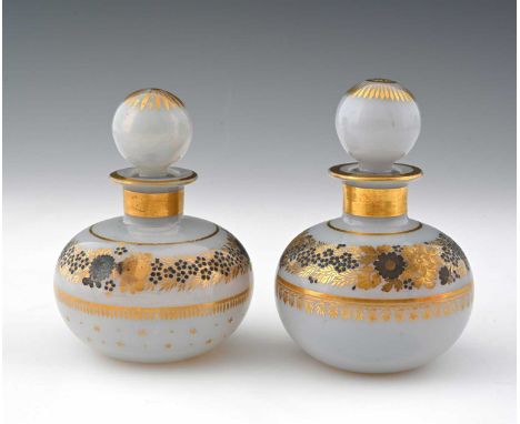 A matched pair of French gilded opaline glass perfume bottles, Bulle de Savon, probably by Jean Baptiste Desvignes, circa 180