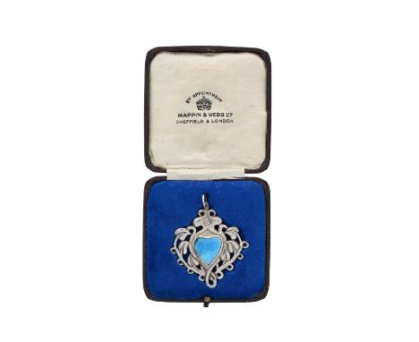 An Arts and Crafts silver and enamelled pendant, Mappin and Webb, circa 1910, reticulated heart form with a central turquoise
