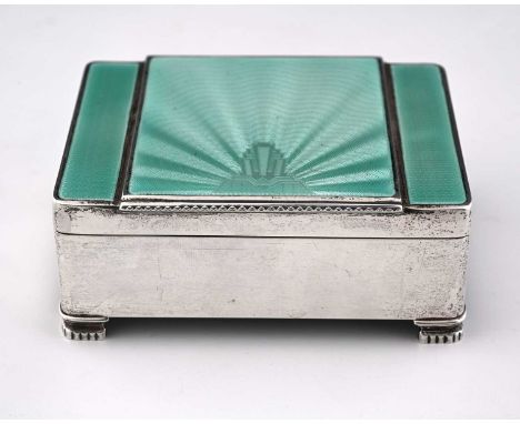 A George V silver Art Deco jewel casket, stepped sunburst green guilloche enamel cover, silk-lined cushioned interior, bracke
