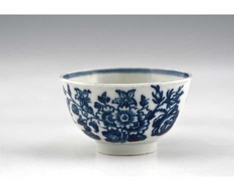 A Worcester blue and white miniature toy tea bowl, crescent mark, circa 1770, decorated in the Three Flower pattern, 5.5cm di