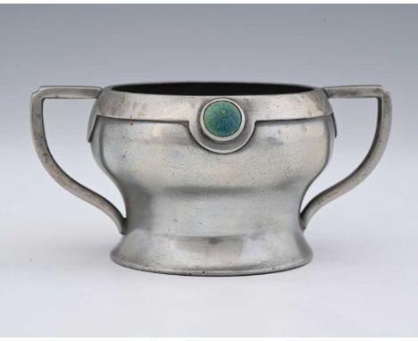 An Arts and Crafts pewter and Ruskin set twin handled bowl, William Hutton, inverse squat baluster form, the rim set with two