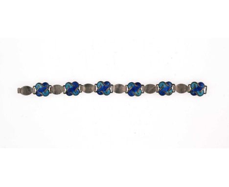 An Arts and Crafts silver and enamelled bracelet, Stainton Brothers, Birmingham 1910, formed of quatrefoul panels in blue and