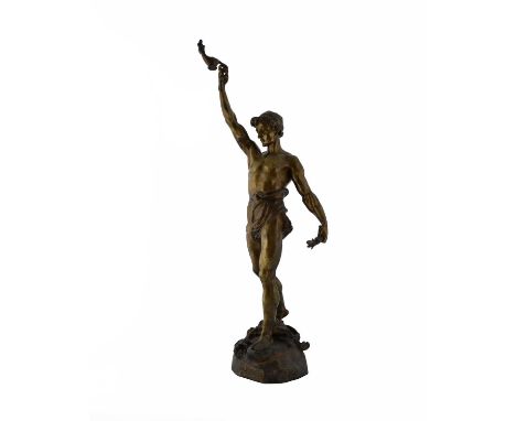 Marcel Debut (1865-1933), a large bronze figure, circa 1890, modelled with arm raised holding a Roman lamp, signed in the cas