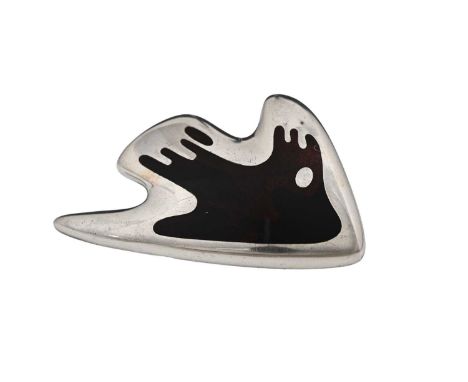 Henning Koppel for Georg Jensen, a Modernist silver and enamelled brooch, model 307, abstract Aztec style with champleve desi