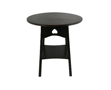 Liberty and Co., an Arts and Crafts oak occasional table, circa 1900, the circular top on splayed and tapered square section 