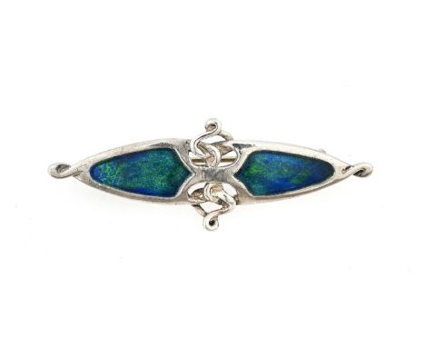 Murrle Bennett, an Arts and Crafts silver and enamelled brooch, lozenge form in the Celtic style with knotted tendrils betwee