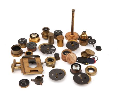 A Large Collection Of Brass Microscope Condensers,  With many Abbe type condensers, wheels of stops, patch stops and other it
