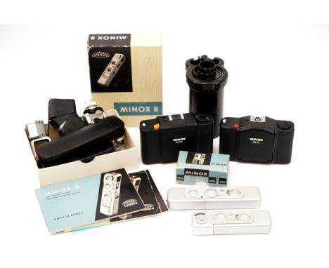 Three Minox Cameras, including Minox 35ML, Minox 35EL, Minox B and Minox C, all in maker's cases with various accessories (a 