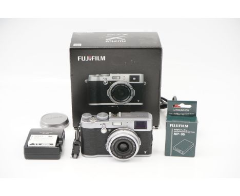 A Fujifilm X100T Compact Digital Camera, with charger and batteries, in maker's box